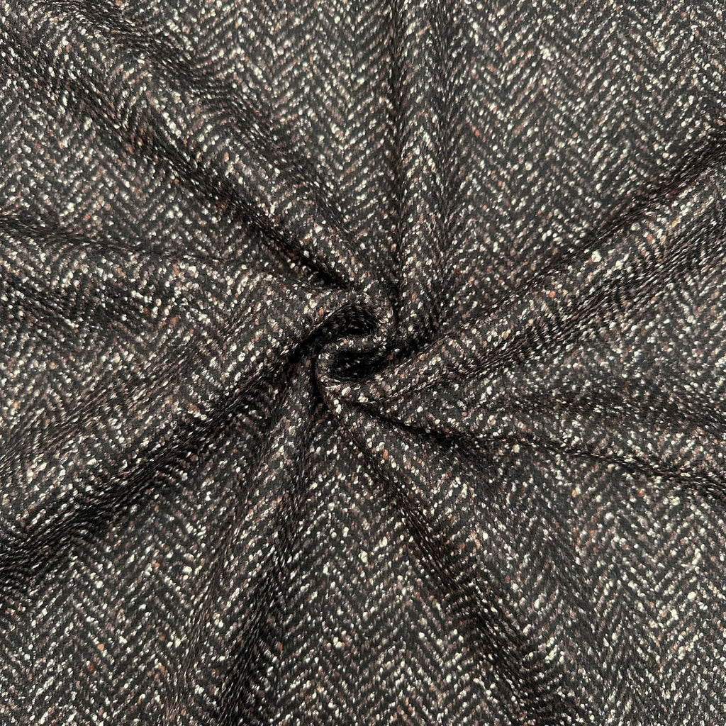 Produktfoto unseres Mantelstoffs in schwarzbraunem Fischgratmuster